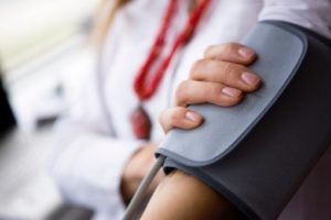 taking blood pressure