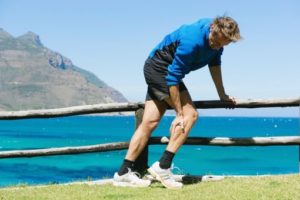 Man suffering from knee pain